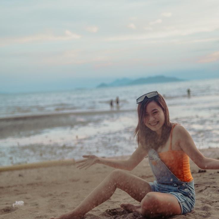 Kaveri Mehta, Lead Design Curator at Cabin Lounge Kettle, reviewing corporate floral arrangements